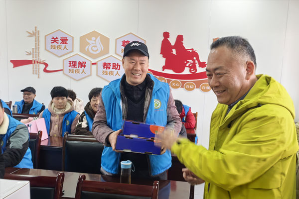 易龙公司 25 周年 爱心助残公益行